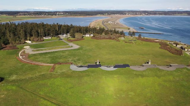 Aerial / drone footage of Puget Sound, Admiralty Bay and Fort Casey State Park on Whidbey Island near Seattle, Washington during the COVID-19 pandemic closure