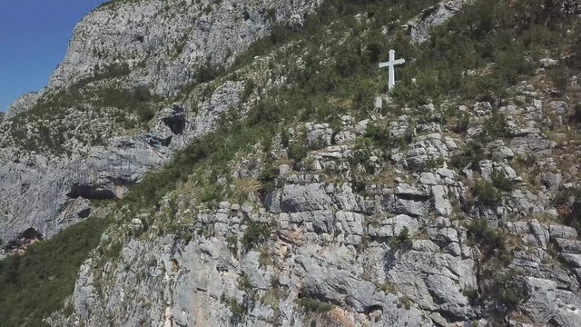 Aerial view of The Monastery of Ostrog, Serbian Orthodox Church situated against a vertical background, high up in the large rock of Ostro&scaron;ka Greda, Montenegro. Dedicated to Saint Basil of Ostrog 