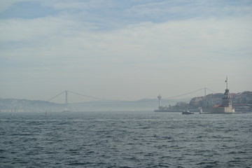 Fototapeta premium view of the maiden's tower and bosphorus bridge in istanbul turkey