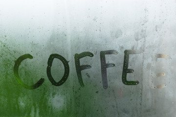 The inscription on the fogged window. Coffee.