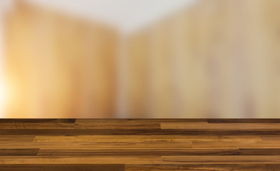 Empty interior with large window. Retro light bulb. The floor is of brown parquet.  3D rendering. wooden table. blurred background