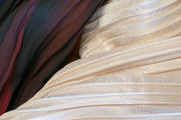 The texture of cotton fabric. Close-up. Different. multi-colored. New.