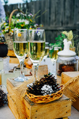 two glasses of champagne and a lot of food