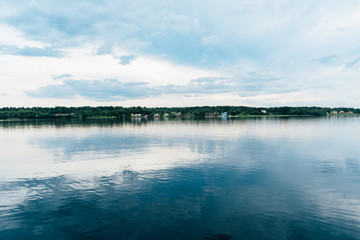 smooth lake and banks with grass