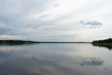 smooth lake and banks with grass