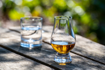 Tasting of scotch single malt whisky from Islay island, most intensely flavoured of all whiskies in Scotland