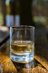 Tasting of scotch single malt whisky from Islay island, most intensely flavoured of all whiskies in Scotland