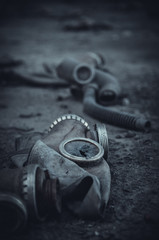 Old gas masks in an abandoned building close-up
