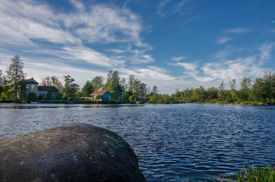 Karelian devnya on the shore of a picturesque small lake