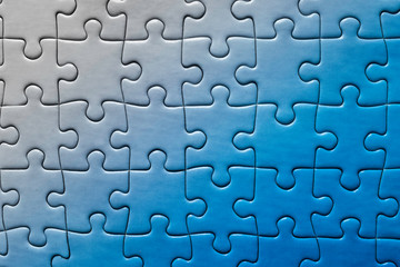 Fototapeta premium Blue pieces puzzle degraded from right to left