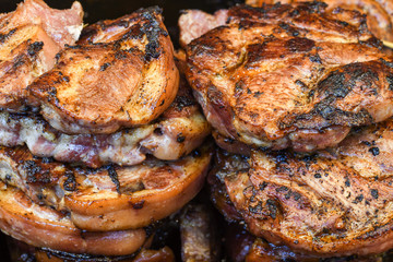 Assorted delicious grilled meat with vegetables over the counter on a barbecue event.