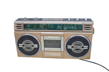 Gold silver retro radio and audio cassette player.classic audio boombox isolated on white...