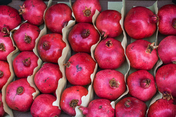 Fresh pomegranate for sale during street food festival.