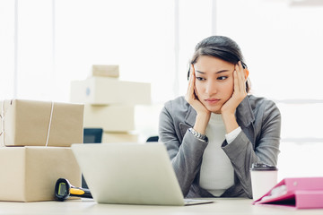 Office syndrome concept. Beautiful young asian businesswoman with office syndrome have problem with part of body arm shoulder head neck back healthy problem after working on laptop for a long time.