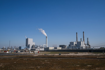 High-voltage power lines. Electricity distribution station. high voltage electric transmission tower. Distribution electric substation with power lines and transformers.