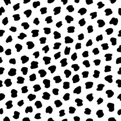 Fototapeta premium Hand drawn black and white seamless dot pattern. Vector abstract texture with chaotic spots.