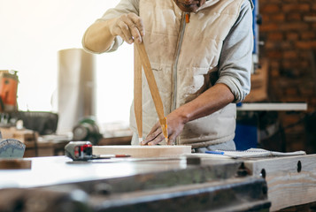 Carpenter works in the carpentry