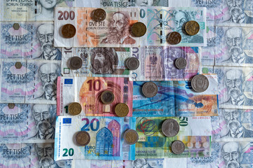Fototapeta na wymiar banknotes and coins of various currencies, Euro CHF CZK PLN