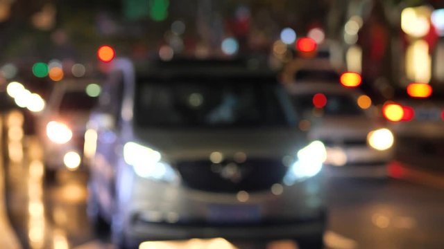 Blur motion of group of cars driving on road. City life, urban scene, car light at night, transport and traffic concept, 4k footage b roll shot.