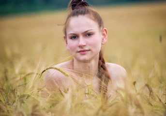 young girl in nature in the summer.