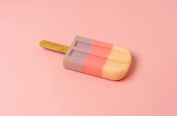 Sign or food of summer season holiday background concept.Lay of sweet pastel ice cream on modern rustic pink paper backdrop.Minimalism & pastel colorful idea creative design.