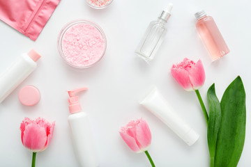 Beauty spa medical skincare make up bath products. Cosmetic bottles, tubes, dispenser, dropper, cream packaging. Cosmetics SPA branding mock-up for bath products background top view flat lay.