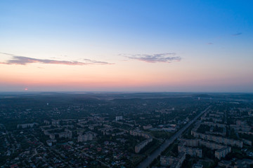 Obraz premium Sunset or dawn over a city in eastern Europe aerial view