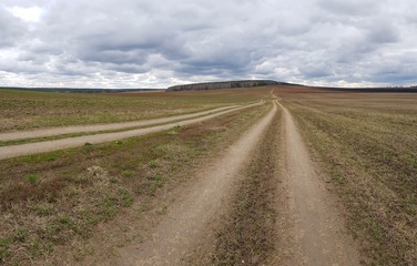 Country dirt road in the field