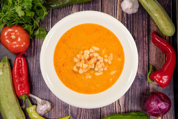 Tasty Beans Soup, Vegetable Soup, Bowl. Traditional hot soup. Top view, on a wooden board