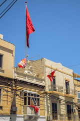 Traditional Maltese architecture in Albert city in Malta, street with traditional balconies and old buildings in historical city of Malta.