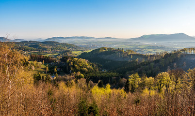 beautiful valley with village and fog in spring morning, Beskydy mountains