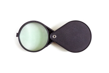 Folding magnifier with plastic case on white