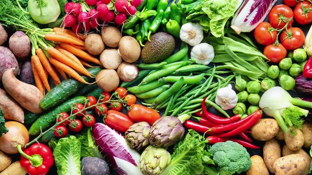 Panoramic food background with assortment of fresh organic vegetables