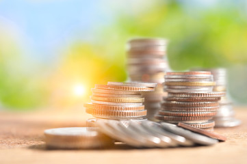 Business Concept, Finance investment saving up money for great financial purpose growing in market and business capital, gross profit with coin stacked in pile with copyspace