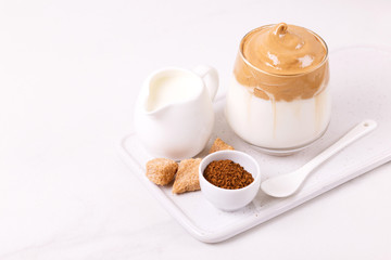whipped dalgona coffee with milk and cane sugar. South Korean summer drink