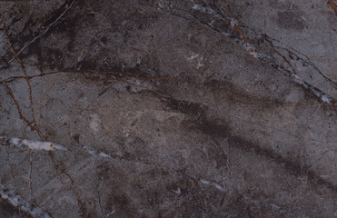 Dark textured granite surface, marble panorama background