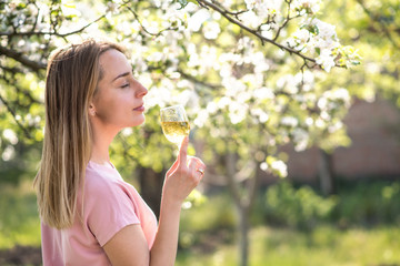 Coronavirus. Woman with face mask on quarantine. Stay at home. Enjoy cooking at home. Family concept. young woman blowing dandelion. glass of champagne on the beach. woman playing with water. woman dr