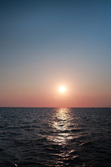 Bright sunset with yellow sun