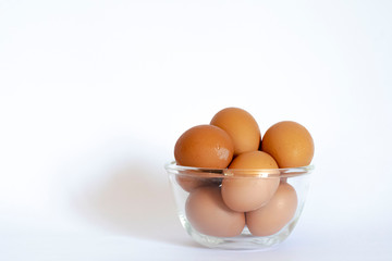 Eggs and corn flour on a white background
