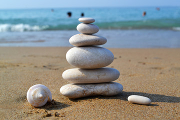 Zen stone tower witha seashell