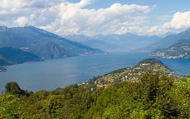 Fototapeta premium A view of a large body of water with a mountain in the background. High quality photo