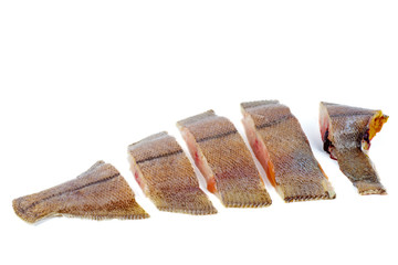 Sliced fresh flatfish on a white background