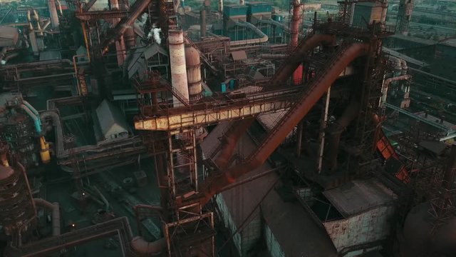 Industrial production plant metallurgical steel aerial video 4K smoke from chad pipes.