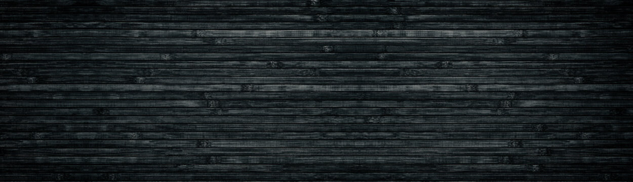 Black wood wide texture. Bamboo planks. Dark long background