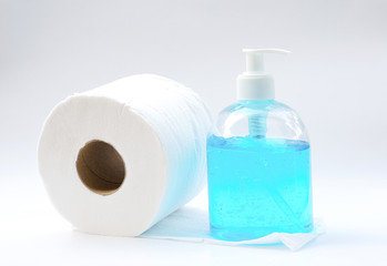 Roll of toilet paper with bottle of hand gel for preventing covid-19 or coronavirus,washing hands,isolated on white background.