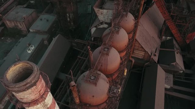 Industrial production plant metallurgical steel aerial video 4K smoke from chad pipes.