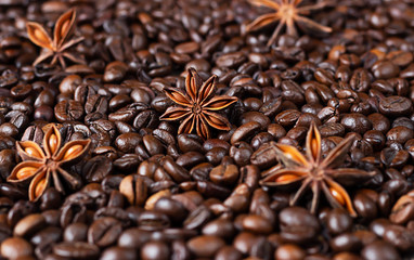 Coffee beans background with anise stars. Christmas concept. Selective focus. Monochrome image. Food background.