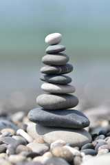 balance pyramid of gray and white stones
