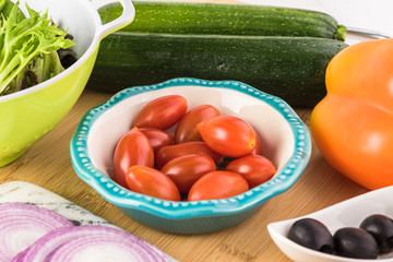 Spiral zucchini noodles salad with variety vegetables.