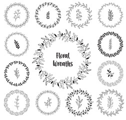 Set of floral wreaths. Hand drawn flourishing frames. Compositions with decorative flowers, herbs, leaves and branches. Vintage botanical illustrations.